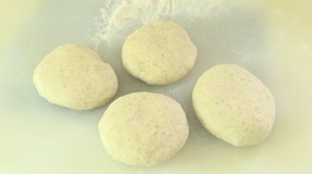 four mini round loaves