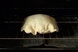 puffed up pita in the oven