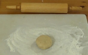 rolling out the dough ball
