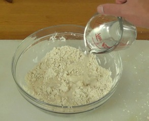 adding water to the flour mixture