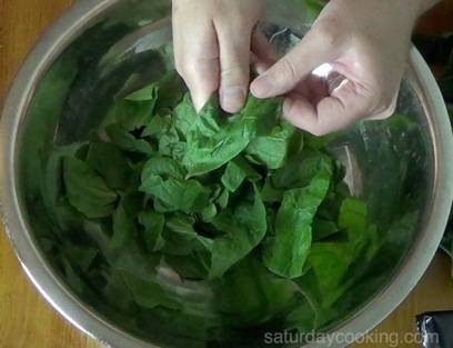 bowl of spinach leaves, stems removed