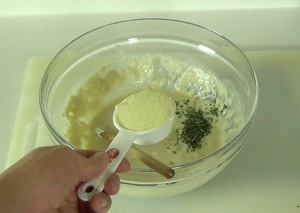 adding semolina to the mixing bowl