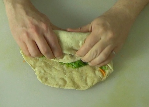 rolling the remaining pita