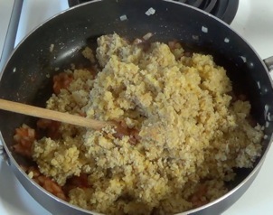 mixing lentils and bulgur with onion mixture