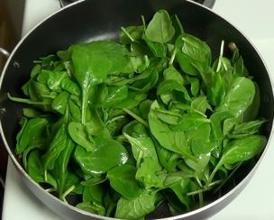 baby spinach in the frying pan