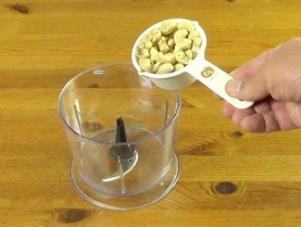 adding cashews to food processor
