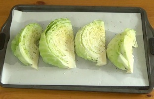 cabbage wedges on parchment paper