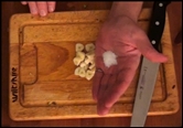 chopping garlic with kosher salt