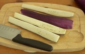 slicing the eggplants lengthwise