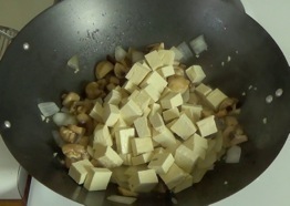adding the tofu