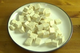 tofu cubes on a plate