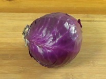 purple cabbage on a cutting board