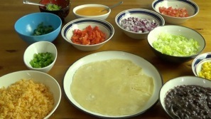 assembling the burrito, put tortilla on a plate