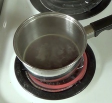 water boiling with soy sauce and liquid smoke