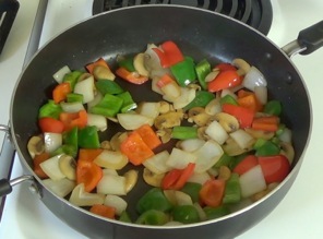 sauteeing onions and peppers